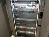 a rack with a lot of wires and wires in it
