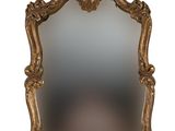 an image of a mirror with a gold frame on a white background
