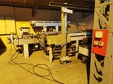 une photo d'un atelier d'usinage où se trouvent de nombreuses machines