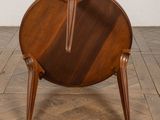 an image of a wooden chair on a parquet floor