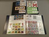 a lot of different stamps on the pages of a book