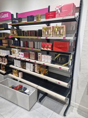 a lot of beauty products on the shelves in the store