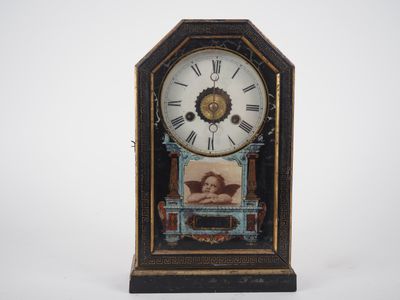 Pendule borne de style Louis XVI en bois noirci et fixé sous…