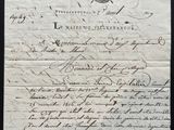 a piece of paper with writing on it sitting on top of a table