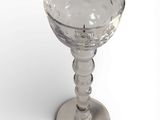 a glass that is sitting on top of a table