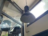 a light that is hanging from the ceiling in the room