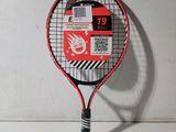 a tennis racket that has a sticker on it