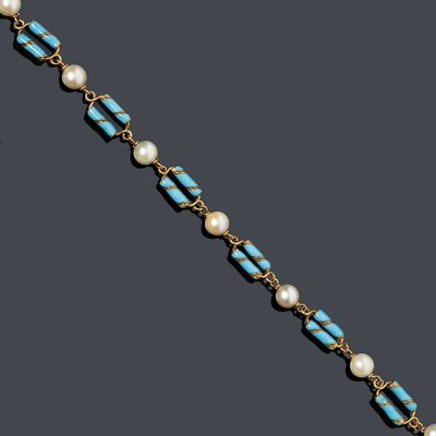 un collier en or, turquoise et perles
