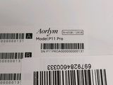 the back of a laptop computer with a bar code on it