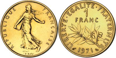 a gold coin with the image of a woman holding a flower