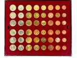 a red box with a lot of coins in it