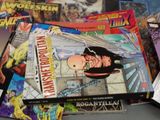 a lot of comic books on the table