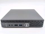 a close up of a dell desktop computer on a white surface