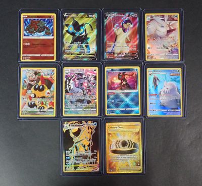 a lot of pokemon cards that are on the table