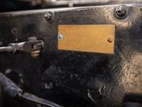 a close up of a metal object with a label on it