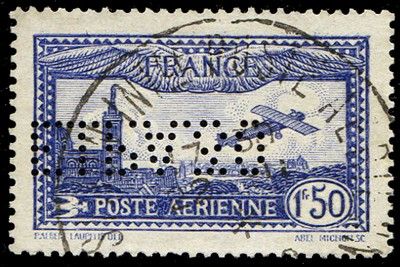 a close up of a stamp with a picture of a plane on it
