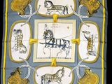 a square scarf with a picture of a horse and carriage on it