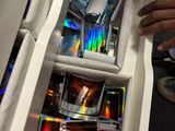 a drawer full of cds and cds in a box