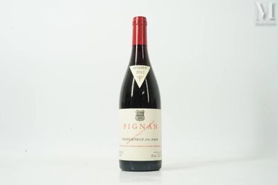 a bottle of wine that is sitting on a table