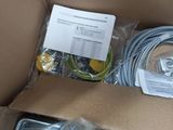 a cardboard box with a bunch of wires and wires in it