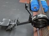 a machine that is sitting on the floor in the gym