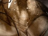 a close up view of a dirty seat of a car
