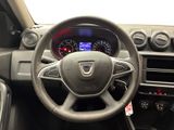 the interior of a car with a steering wheel and dashboard controls
