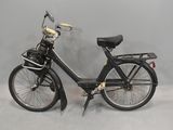 a black bicycle with a basket on the back of it