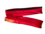 pair of red pants with black trims on a white background