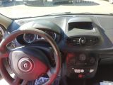 dashboard view of a car with a steering wheel and dashboard controls
