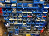 many different types of screws and nuts in the garage