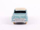 a toy car that is sitting on a white surface