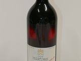 a bottle of wine that is sitting on a table