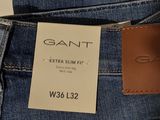 the back of a pair of jeans with a leather label on it