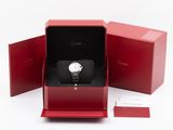 an image of a red box with a watch inside of it