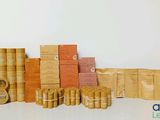 many books stacked on top of each other on a table