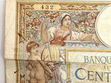 an old bank note with a picture of a woman and a child on it