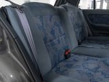 a car that has a blue seat cover on it