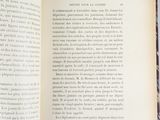 an open book that has a picture of a cat on it