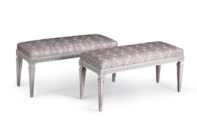 pair of upholstered benches with upholstered foot rest