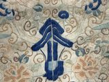 a blue and white picture of a person on a rug