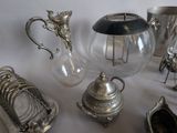 a lot of silver items that are on a table