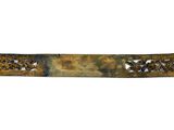 an old metal belt with a decorative design on it