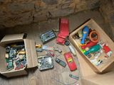 a box full of assorted electronic components on the floor