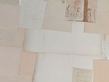 a bunch of papers that are on a table