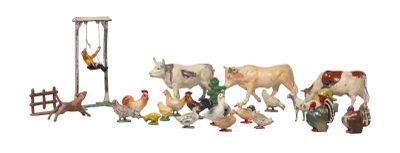 many figurines of farm animals and chickens in a row