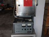 a machine that is sitting on top of a cabinet
