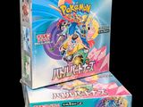 two boxes of pokemon card games are stacked on top of each other