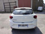 a white car that is parked in a parking lot