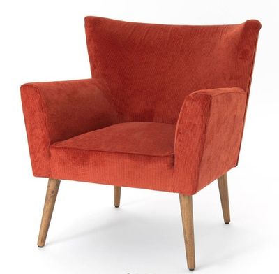une chaise orange aux pieds en bois sur fond blanc